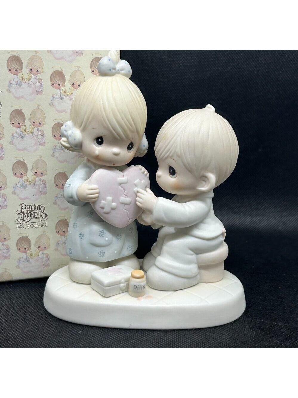 Precious Moments "He's the healer of broken hearts" figurine